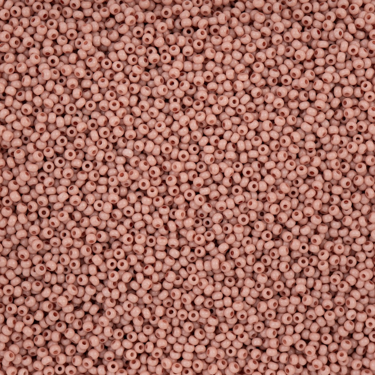 Close-up of Preciosa 11/0 Czech glass seed beads in dyed rose terra