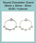 Two silver-tone 28 x 30mm round chandelier charms with loops along the bottom