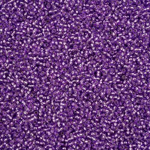 Close-up of Preciosa 11/0 Czech glass seed beads in silver-lined grape