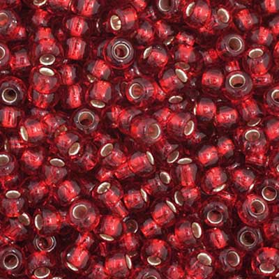 Close-up of Preciosa 11/0 Czech glass seed beads in opaque silverlined medium red