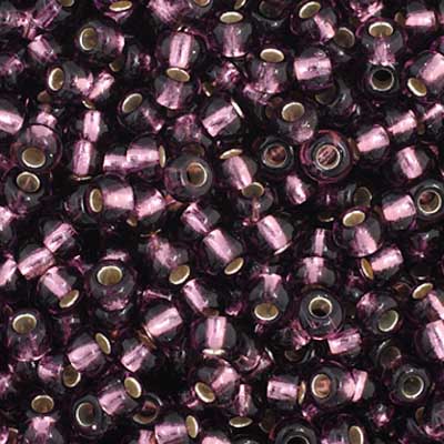 Close-up of Preciosa 11/0 Czech glass seed beads in silver-lined purple