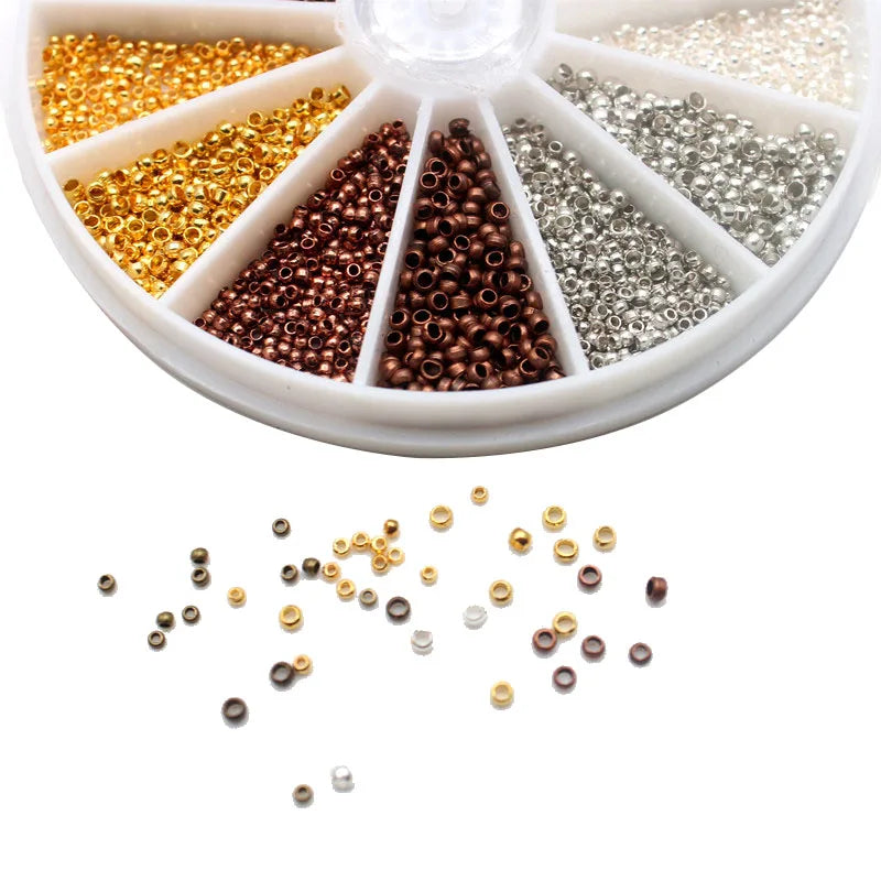 Wheel case of mixed metal crimp beads with a few loose crimps scattered in front