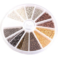 Round divided case of mixed metal crimp beads in gold, silver, copper and bronze tones