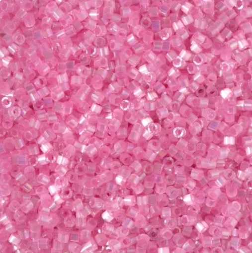 Close-up of Miyuki Delica 11/0 DB1875 cylinder beads in dyed inside tropical punch with a silk satin sheen