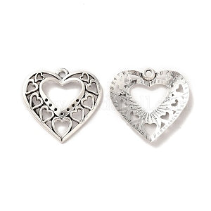 Two silver-tone 24.5mm filigree heart charms made of many small hearts