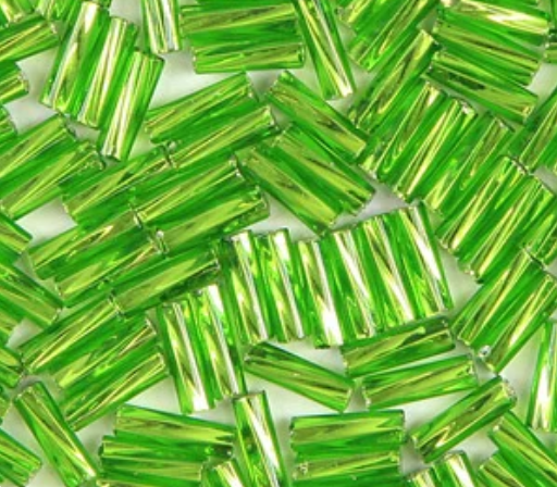 Close-up of loose twisted 6mm Preciosa Czech glass bugle beads in silver-lined chartreuse