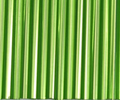 Rows of 30mm Preciosa Czech glass bugle beads in silver-lined chartreuse