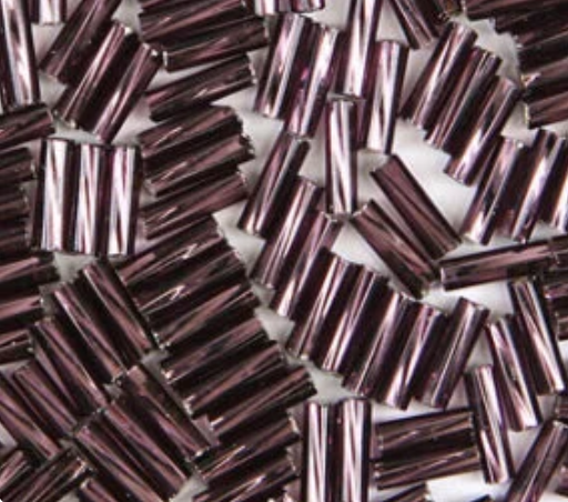 Close-up of loose twisted 6mm Preciosa Czech glass bugle beads in silver-lined dark amethyst