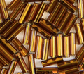 Close-up of loose 6mm Preciosa Czech glass bugle beads in silver-lined dark brown