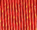 Rows of twisted 30mm Preciosa Czech glass bugle beads in silver-lined light red
