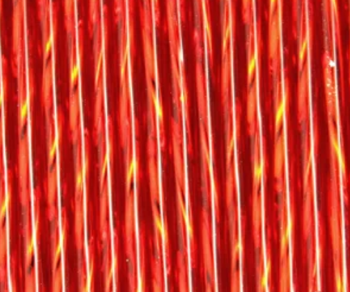 Rows of twisted 30mm Preciosa Czech glass bugle beads in silver-lined light red