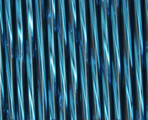 Rows of twisted 30mm Preciosa Czech glass bugle beads in silver-lined montana