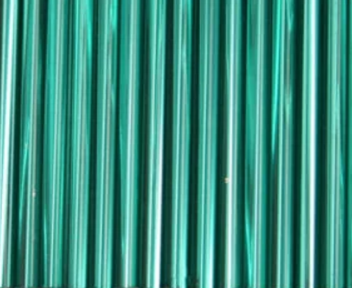 Rows of 30mm Preciosa Czech glass bugle beads in silver-lined teal