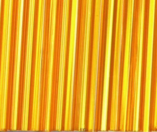 Rows of 30mm Preciosa Czech glass bugle beads in silver-lined light orange