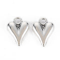 Two silver 16 x 11.5mm puffy heart charms on a white background