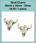 Two silver-tone 38 x 41mm steer skull charms with wide horns