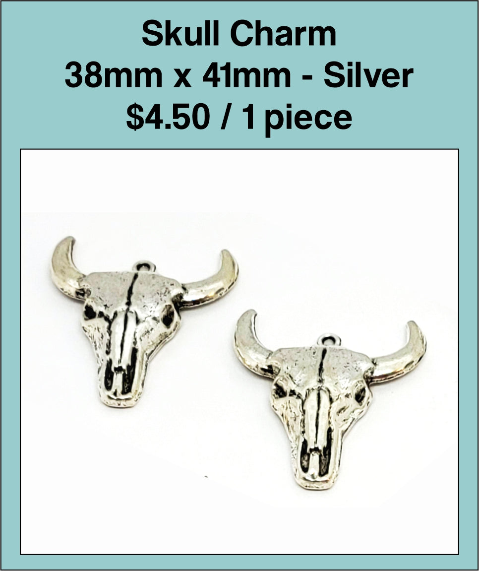 Two silver-tone 38 x 41mm steer skull charms with wide horns