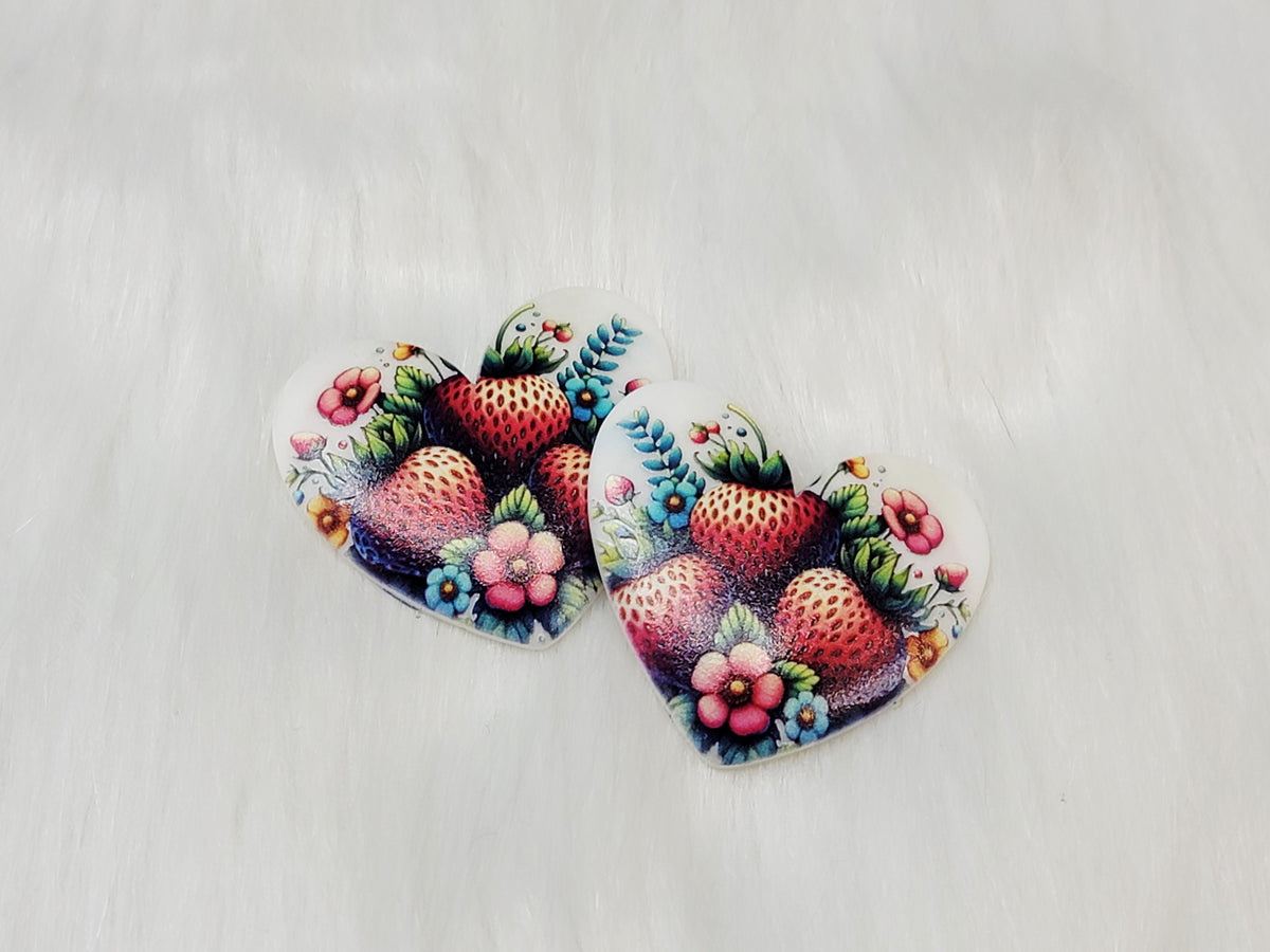 Pair of 37mm resin heart cabochons (cabs) in white with strawberries and pink flowers