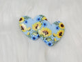 Pair of 37mm resin heart cabochons (cabs) in light blue with sunflowers and blue flowers