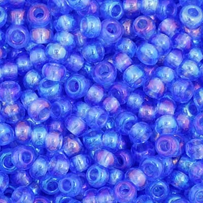 Close-up of Preciosa 11/0 Czech glass seed beads in transparent blue with an AB rainbow finish