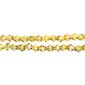 Two strands of Crystal Lane 4mm faceted glass bicone beads in transparent light amber with purple luster