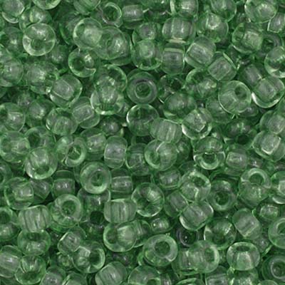 Close-up of Preciosa 11/0 Czech glass seed beads in transparent light green
