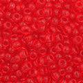 Close-up of Preciosa 11/0 Czech glass seed beads in transparent light red