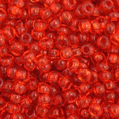 Close-up of Preciosa 11/0 Czech glass seed beads in transparent orange