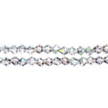 Two strands of Crystal Lane 4mm faceted glass bicone beads in transparent rose green luster