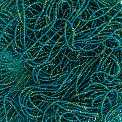 Close-up of strung Preciosa 13/0 true cut charlotte beads in transparent teal with a luster finish
