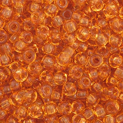Close-up of Preciosa 11/0 Czech glass seed beads in transparent topaz