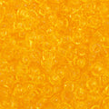 Close-up of Preciosa 11/0 Czech glass seed beads in transparent yellow