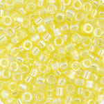 Close-up of Miyuki Delica 11/0 DB0171 cylinder beads in transparent yellow with an AB rainbow finish