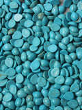 Pile of 10 x 14mm dyed howlite turquoise drop cabochons (cabs) with natural veining