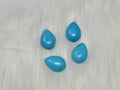 18 x 25mm dyed howlite turquoise drop cabochons (cabs) with dark veining, on white fur