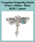 Silver-tone 47 x 46mm dragonfly charm with a patterned body and turquoise-coloured accents