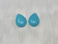 30 x 40mm dyed howlite turquoise drop cabochons (cabs) with dark veining, on white fur