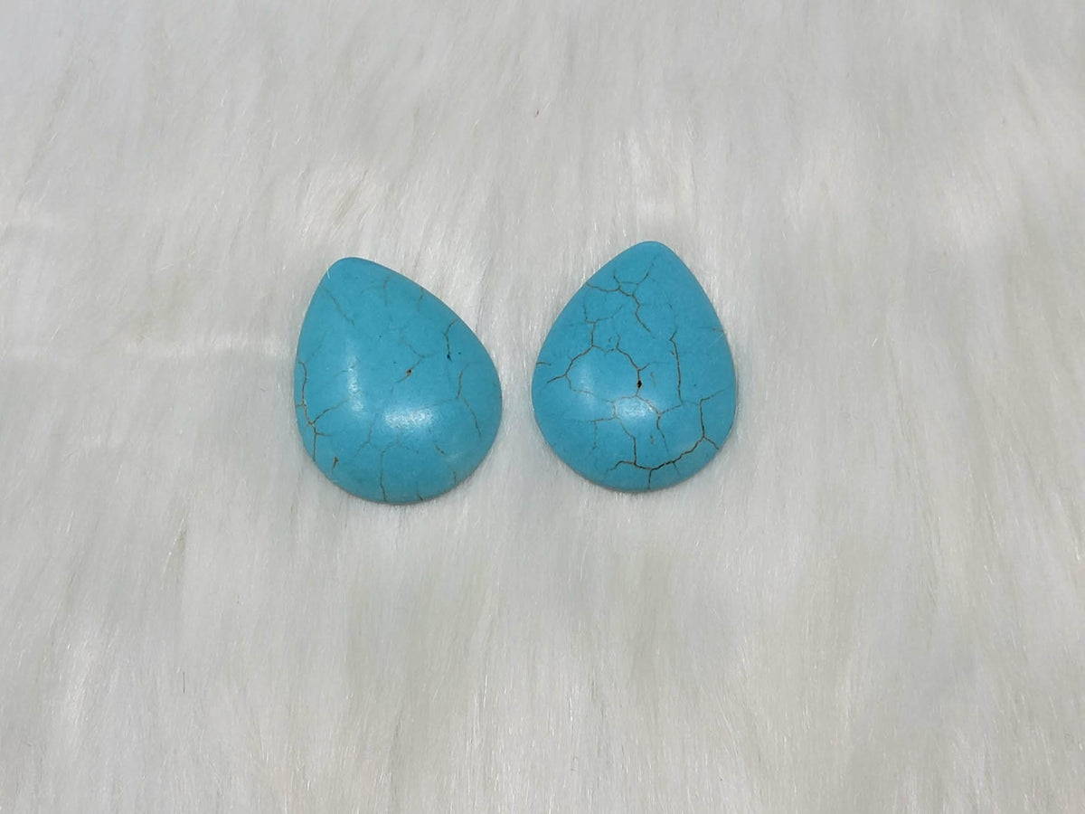 30 x 40mm dyed howlite turquoise drop cabochons (cabs) with dark veining, on white fur