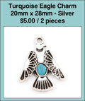 Silver-tone 20 x 28mm eagle charm with a turquoise-coloured stone at its centre