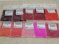Ten 25g bags of Preciosa 11/0 seed beads in Valentine shades of burgundy, red, coral, pink and fuchsia
