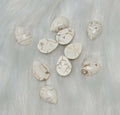 13 x 18mm dyed howlite white drop cabochons (cabs) with dark veining, on white fur
