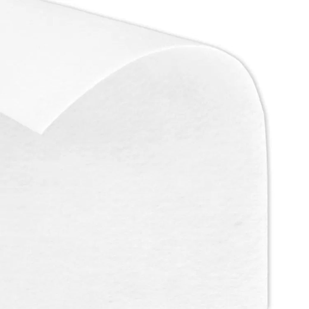 Sheet of white extra firm beading pellon curling at one corner