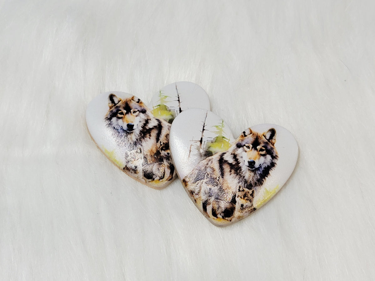 Pair of 37mm resin heart cabochons (cabs) in white with a wolf and pups