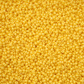Close-up of Preciosa 11/0 Czech glass seed beads in yellow chalk solgel