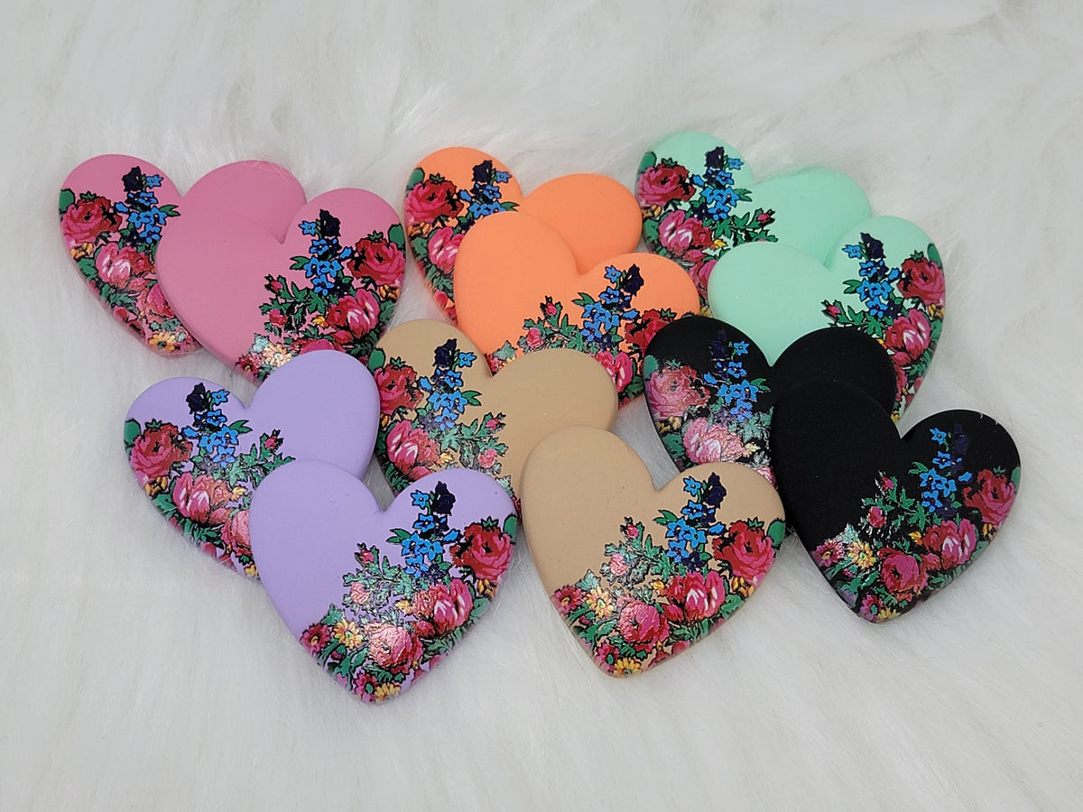 Six pairs of the 37mm kokum floral heart cabochons in pink, orange, mint, lilac, tan and black, showing the colour range