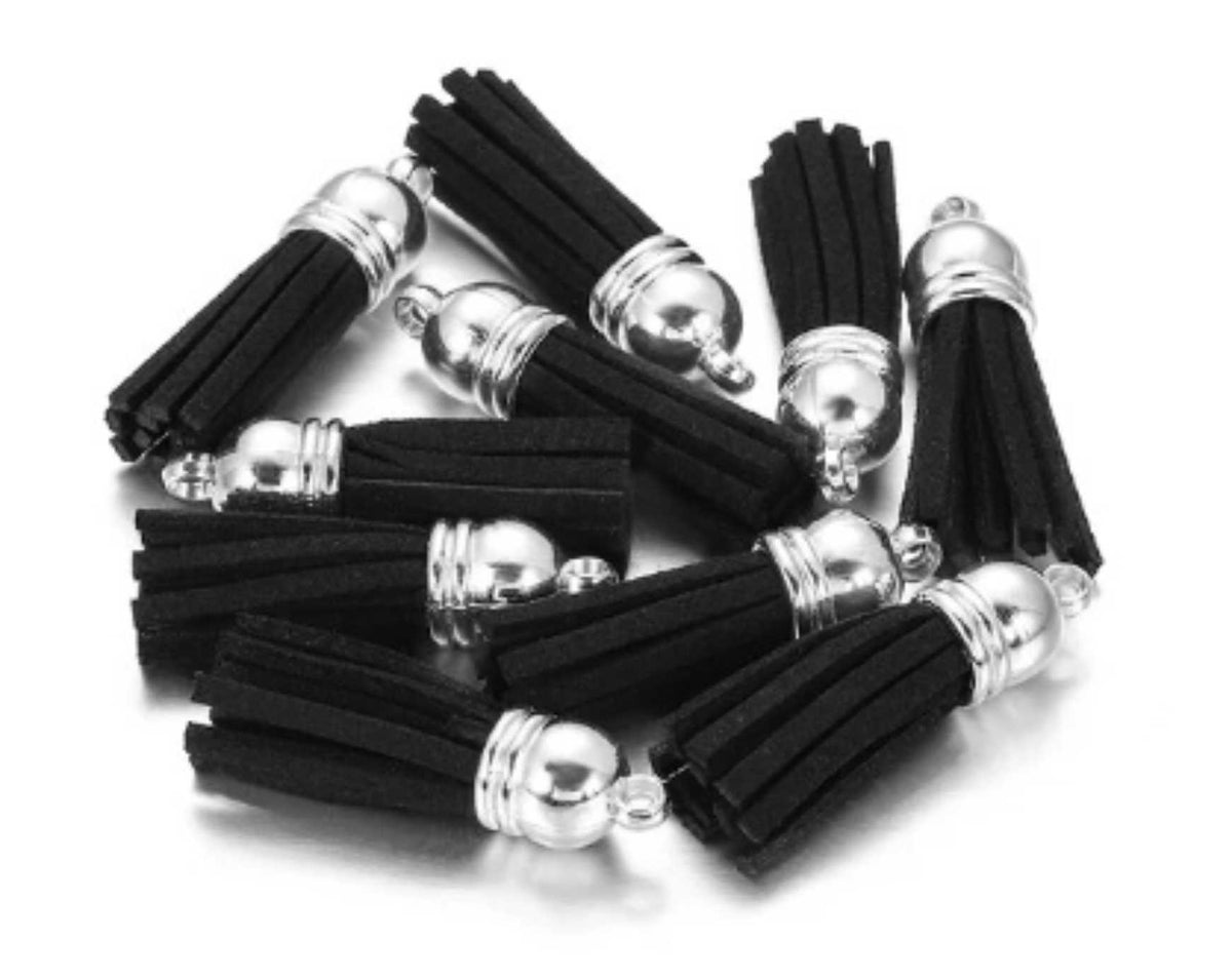 Pile of 38mm black leather fringe tassels with silver-tone caps and loops