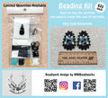 Beading kit bag of beads and supplies beside the finished black, gold and white marbled drop earrings it makes, with a ruler
