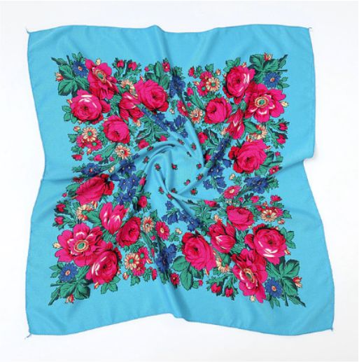 27 x 27 inch light blue kokum scarf laid flat with a border of pink roses, blue flowers and green leaves