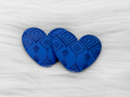 Pair of 37mm resin heart cabochons (cabs) in cobalt blue with an embossed geometric pattern