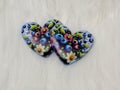 Pair of 37mm resin heart cabochons (cabs) in navy with blueberries and pastel flowers